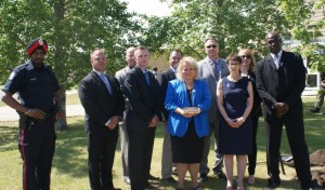 Talmud Torah Principal Judith Boyle and Executive Director Frida Pesin with Sargeant Ray Wilson and other members of the Edmonton Police Service.