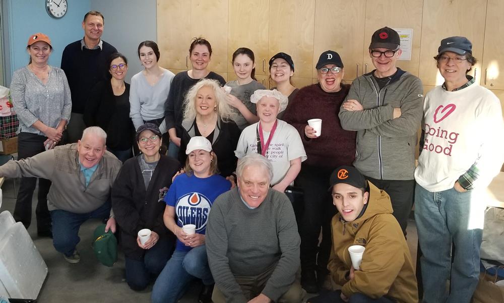 Jewish community members serve lunch at the Edmonton Bissell Centre